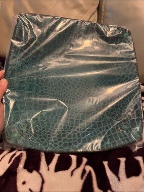 Teal Croc-Embossed Square bowl.